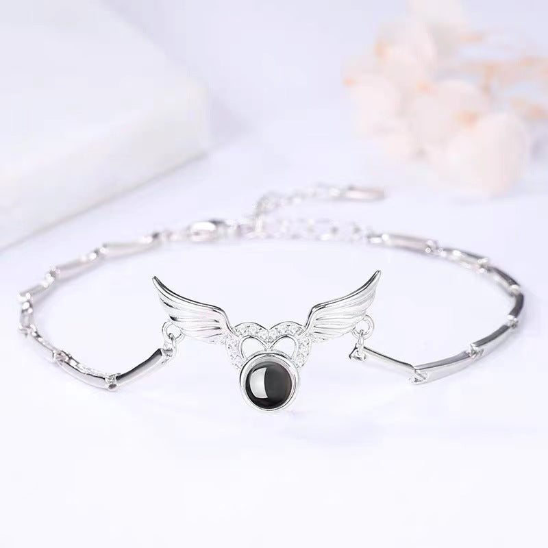Noble and fashionable angel wings projection bracelet