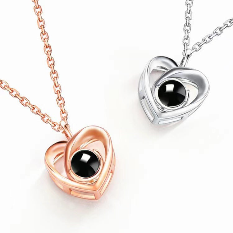 Fashion simple hollow heart projection necklace