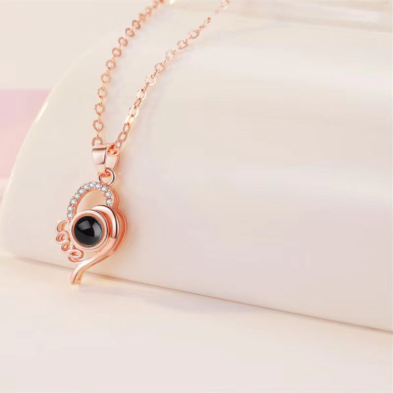 Trendy fashion heart with LOVE design projection necklace