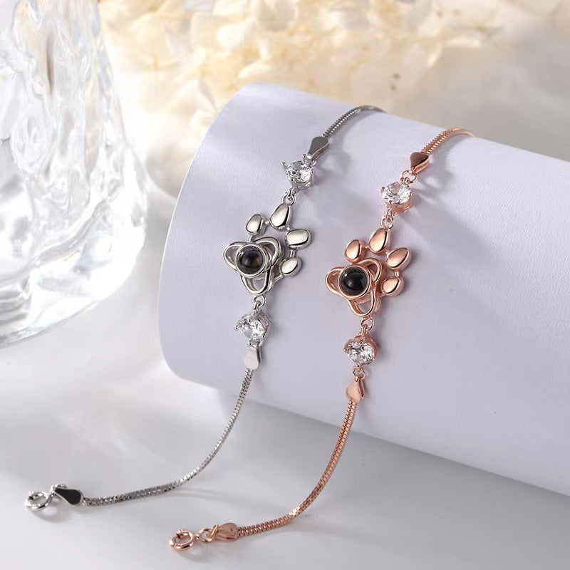 Exquisite and dazzling dog paw print projection bracelet